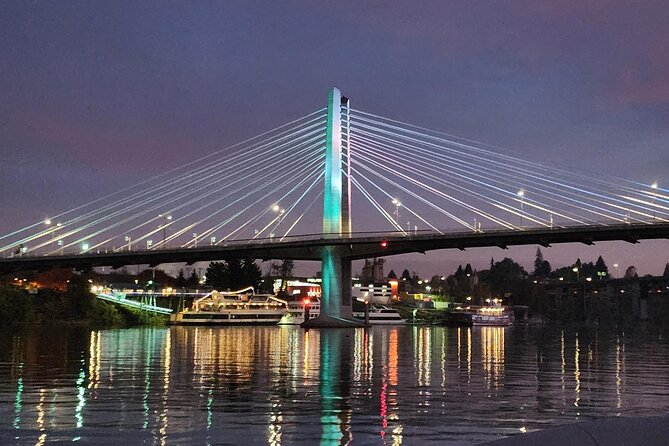 2-Hour Sunset River Cruise on the Stunning Willamette River - White Stag sign glow and the Steel Bridge’s clever design