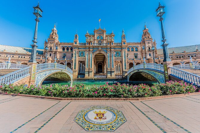 Alcazar, Cathedral, Santa Cruz Quarter, Bullring and River Cruise Tour in Seville - Triana: Panoramas, Bohemian Atmosphere, and Bridge Views