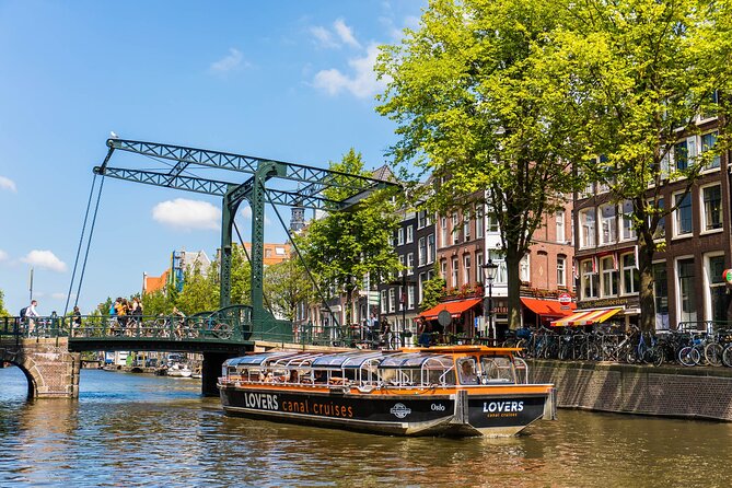 Amsterdam 1h Canal Cruise by Semi-Open Boat with Audio Guide - Finding Lovers Canal Cruises on Prins Hendrikkade (Near Centraal)
