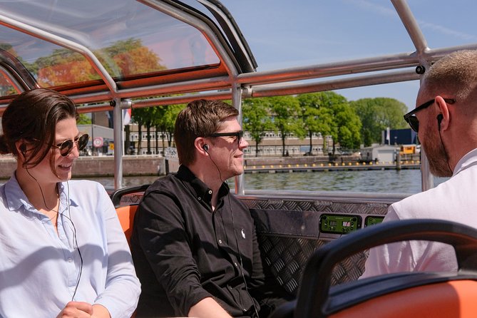 Amsterdam 1h Canal Cruise by Semi-Open Boat with Audio Guide - Museums and Big Names You Can Spot Without Detouring