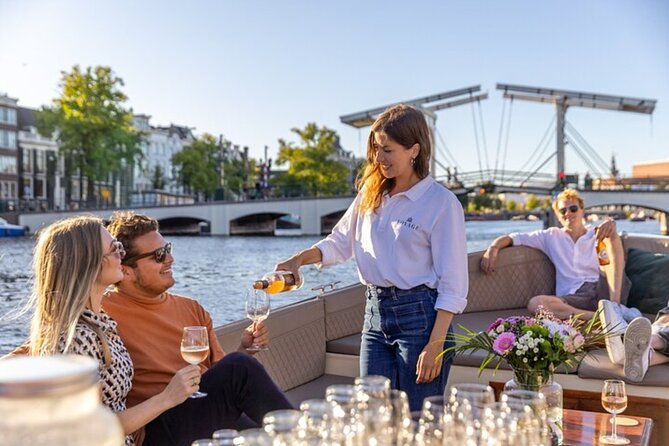 Amsterdam 2 Hour Small-Group Canal Cruise with Dutch Snacks & Bar - The live skipper voice: how to get more out of every canal pass