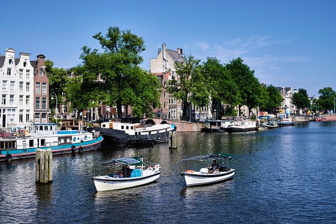 Amsterdam: 60-Minute Guided Private Canal Cruise with Drinks - The UNESCO canal belt and Golden Age stories you can actually hear