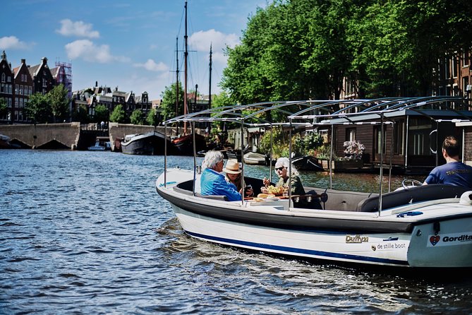 Amsterdam: 60-Minute Guided Private Canal Cruise with Drinks - Herengracht Golden Bend mansions and the Seven Bridges arches