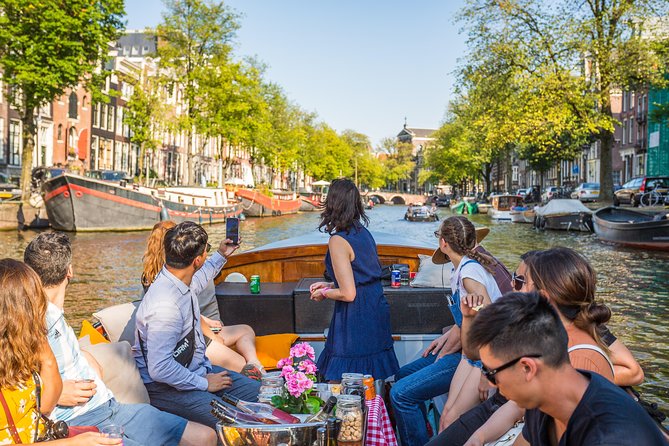 Amsterdam All-Inclusive 90-Minutes Heated Cruise by Captain Jack - Red Light District sights, Oude Kerk, and the Bulldog coffee shop