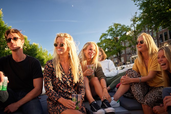 Amsterdam All-Inclusive 90-Minutes Heated Cruise by Captain Jack - Boarding tips: arrive early, expect a step, and plan for window visibility