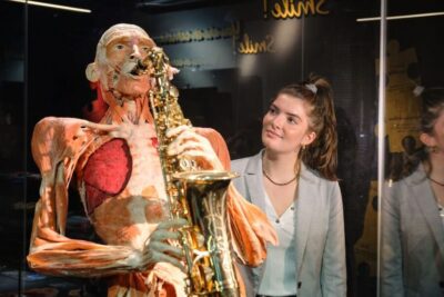 Amsterdam: Body Worlds Exhibition and Canal Cruise - How happiness becomes biology (and why it holds attention)