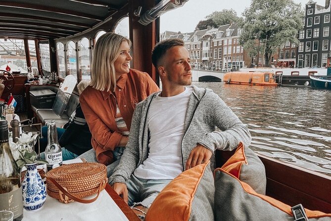 Amsterdam Canal Cruise in Classic Salon Boat With Drinks and Cheese - Weather reality: cold water, good days only