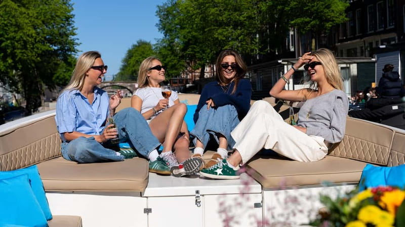 Amsterdam: Canal Cruise in Open Boat with Drink Option - When to go: timing for photos and comfort