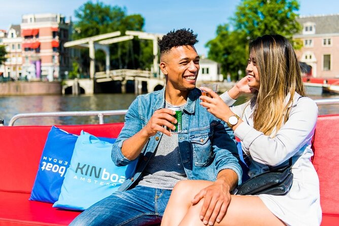 Amsterdam Canal Cruise in Open Boat with Unlimited Drinks Option - Gliding around UNESCO canals on a glass-topped boat