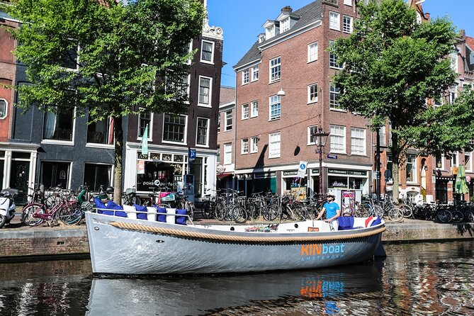 Amsterdam Canal Cruise in Open Boat with Unlimited Drinks Option - Cruising past the Hermitage Museum area