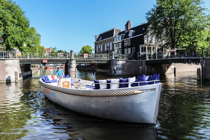 Amsterdam Canal Cruise in Open Boat with Unlimited Drinks Option - Unlimited drinks: fun perk, but clarify it first