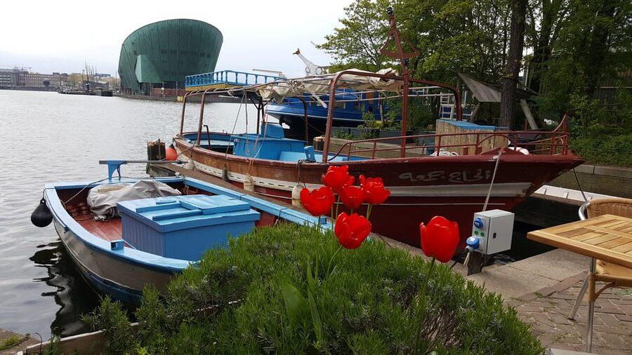 Amsterdam: Canal Cruise on a Wooden Refugee Boat - The Guides: Captains and Storytellers with Refugee Backgrounds