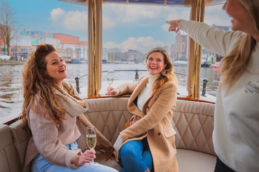 Amsterdam: Canal Cruise with Bubbles & Bites - Red Light District and Old Harbor Views Without the Street Noise