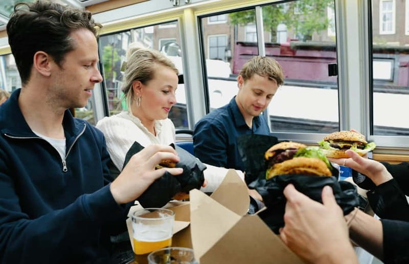 Amsterdam canal cruise with culinary burger or cheese & wine - The Skipper Host: Stories, Audio Support, and Real Hospitality
