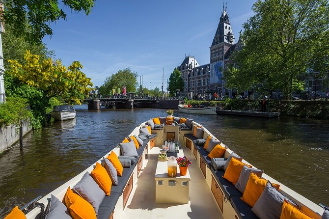 Amsterdam Canal Cruise with German Guide and unlimited drinks - Unlimited drinks on board: great value, but manage your expectations