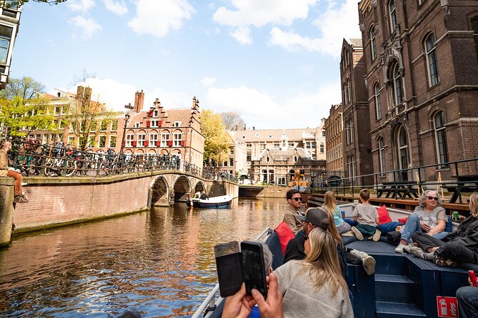 Amsterdam Canal Cruise with Live Guide and Two Drinks - Westerkerk Pass-By: the classic Amsterdam skyline moment