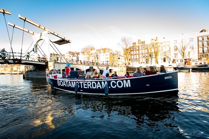 Amsterdam Canal Cruise With Live Guide and Unlimited Drinks - Jordaan and the in-between corners: where the city feels lived in