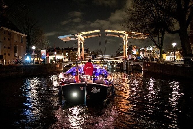 Amsterdam Canal Cruise With Live Guide and Unlimited Drinks - Drinks, snacks (not included), and how the vibe stays relaxed