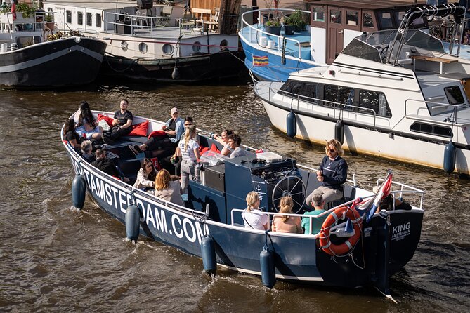 Amsterdam Canal Cruise with Live guide & Two drinks - Central St. - Key Highlights That Matter on the Water