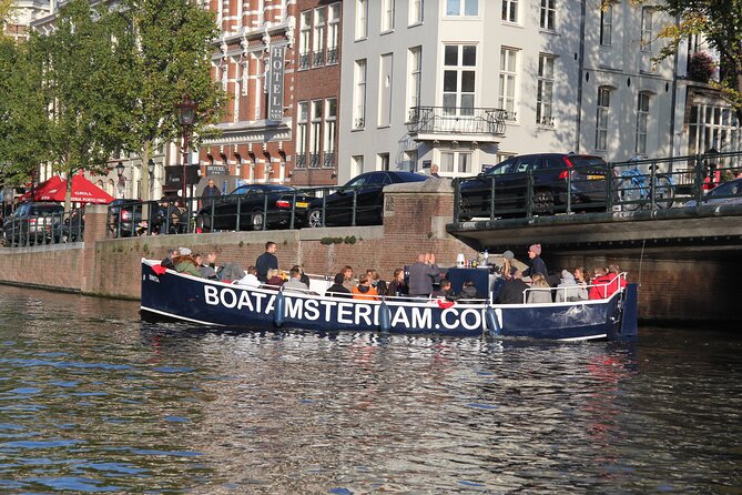 Amsterdam Canal Cruise with Open Bar - Central Station - Weeping Tower and the defensive story you can’t get from street level
