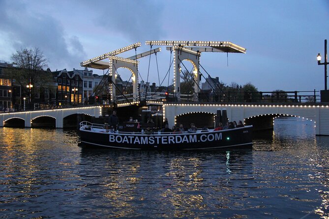 Amsterdam Canal Cruise with Open Bar - Central Station - Red Light District and canal landmarks: see it, understand it, keep moving
