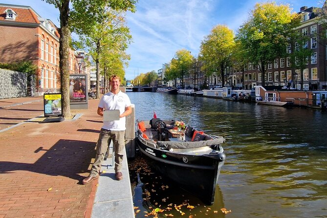 Amsterdam Canal Tour by Open Boat – 90 min Small Group Experience - Geldersekade, Herengracht, and the canal belt price-to-power story