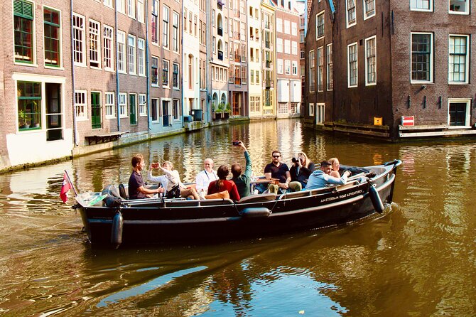 Amsterdam Canal Tour by Open Boat – 90 min Small Group Experience - Why the guide style makes a difference more than you think
