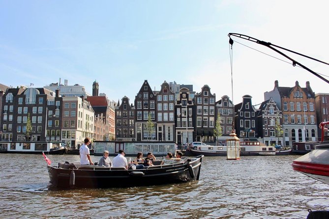 Amsterdam Canal Tour by Open Boat – 90 min Small Group Experience - From Nieuwe Keizersgracht to the Amstel: leaning buildings and dancing houses
