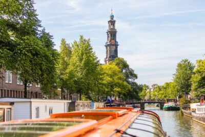 Amsterdam: City Canal Cruise and Heineken Experience - The 1-hour Canal Belt cruise: GPS audio makes the difference
