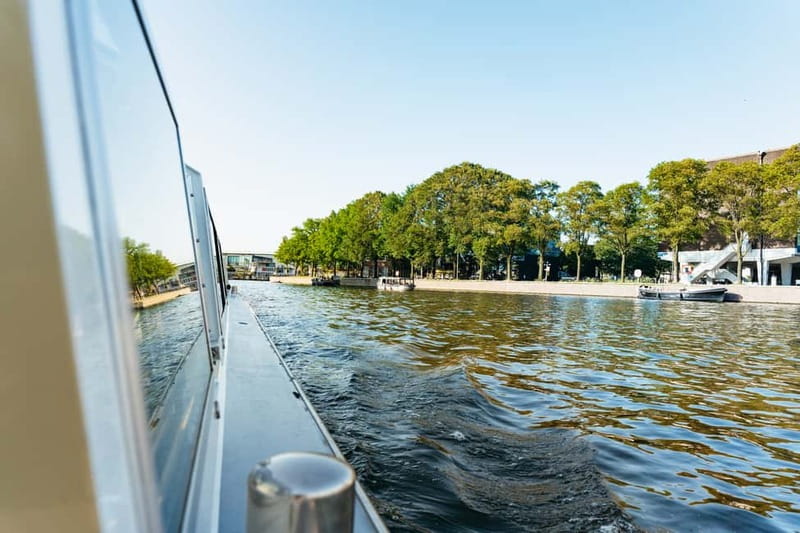 Amsterdam: City Centre Canal Cruise & Free Flower Cocktail - Itinerary Walk-Through: From Pier to Bridges, in Plain Language