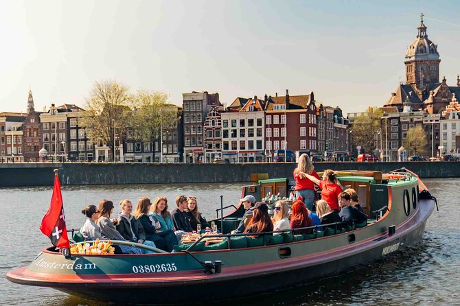 Amsterdam Classic Canal Cruise on a Historic Tugboat - Entering Amsterdam Central Canal Views from Stationsplein 28