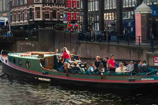 Amsterdam Classic Canal Cruise on a Historic Tugboat - Churches and towers: using the skyline as a navigation tool