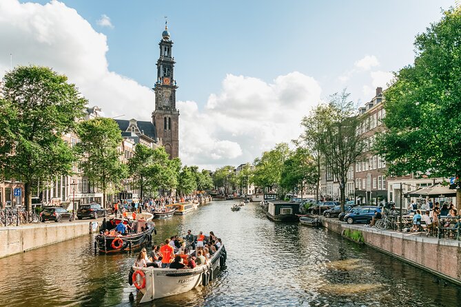 Amsterdam Classic Saloon Boat Canal Cruise with Live Guide - The live guide: how to get more out of the ride