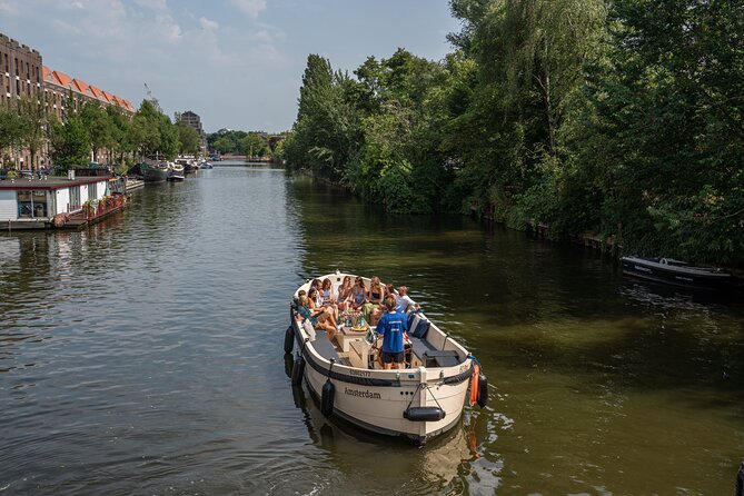 Amsterdam: Evening Candle Light Cruise With Wine & Cheese - Meeting point: Oudezijds Voorburgwal for a smooth start