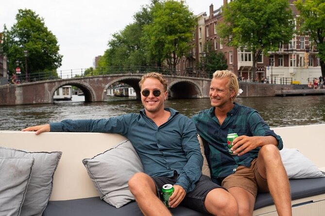 Amsterdam: Evening Candle Light Cruise With Wine & Cheese - Amstel River views and Magere Brug at night