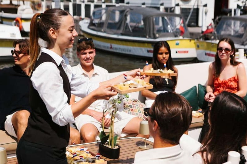 Amsterdam Evening (Sunset) Canal Cruise w/ optional drinks - Hearing the Tour: English Skipper, No Microphones, and an 8-Language Digital Guide
