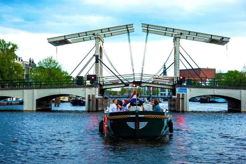 Amsterdam Evening (Sunset) Canal Cruise w/ optional drinks - Lights at Dusk: What Makes the Evening Cruise Feel Different