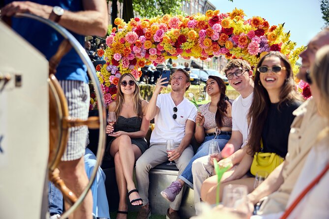 Amsterdam Flower Boat Canal Cruise with Local Guide - Route Highlights: Amstel River, Herengracht, and the Seven Bridges Loop