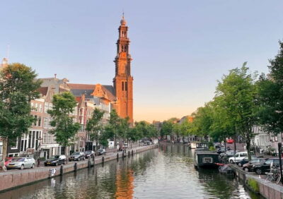 Amsterdam: German Canal Cruise with Unlimited Drinks Option - The one-hour route: Amstel, canal belt, and quick photo stops