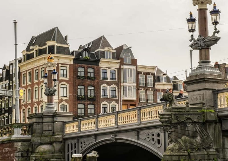 Amsterdam: German Canal Cruise with Unlimited Drinks Option - Electric motor + small-boat comfort = a calmer ride