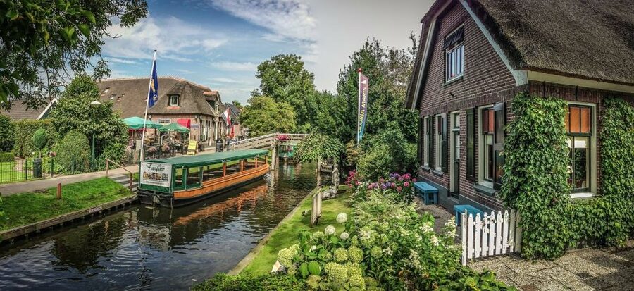 Amsterdam: Giethoorn Tour with Canal Cruise and Windmills - Door-to-door luxury: pickup, WiFi, and a private day that stays flexible