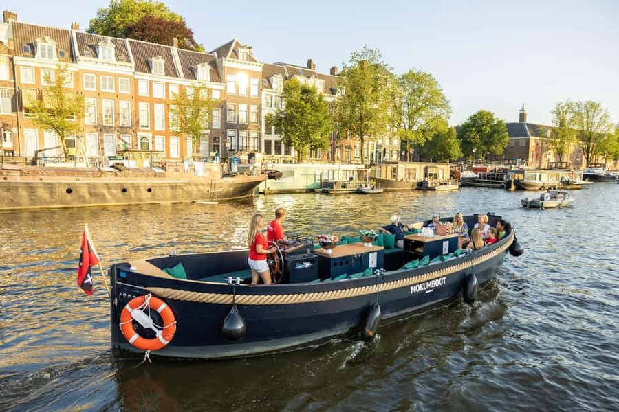 Amsterdam: Guided Open Boat Canal Cruise Including Drink - Where you meet and how the departure works (Central Station and a backup dock)