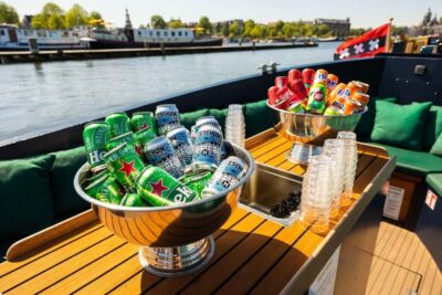 Amsterdam: Guided Open Boat Canal Cruise Including Drink - Price and value: $26 for 60 minutes with a guide and a drink