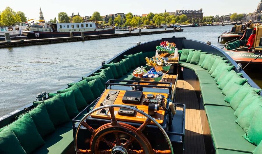 Amsterdam: Guided Open Boat Canal Cruise Including Drink - Where this tour fits best in your Amsterdam plan