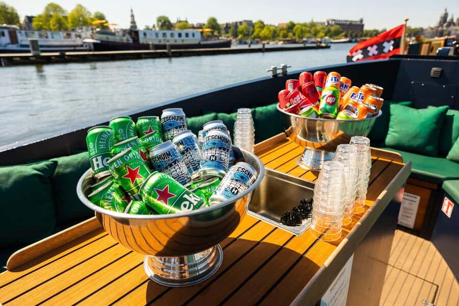 Amsterdam: Guided Open Boat Canal Cruise Including Drink - Price and value: $26 for 60 minutes with a guide and a drink