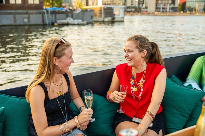 Amsterdam: Guided Open Boat Canal Cruise Unlimited Drinks Option - Jordaan Mood and Westermarkt Edges: Homomonument, Westerkerk, Anne Frank, and the Lock