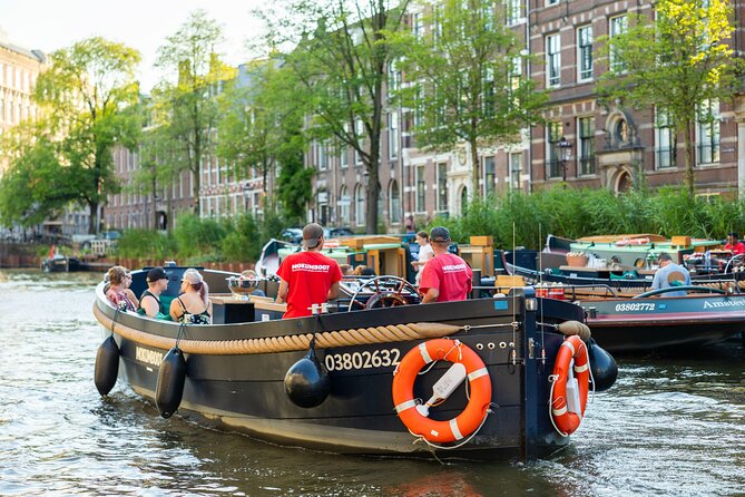 Amsterdam: Guided Open Boat Canal Cruise Unlimited Drinks Option - Drinks, Blankets, and Avoiding the Common Frustration Points