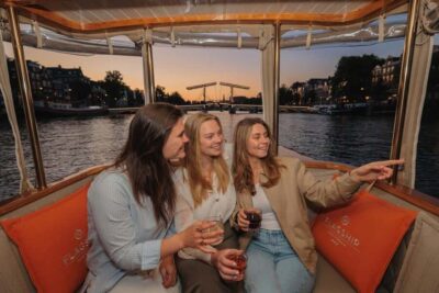 Amsterdam: Heated Canal Cruise with Unlimited Drinks & Bite - Heated Comfort, Open-Air Views, and When the Boat Turns Enclosed