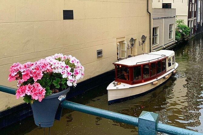Amsterdam Highlights Canal Cruise with a Drink - On-board experience: classic wooden boat, restroom, and quiet time