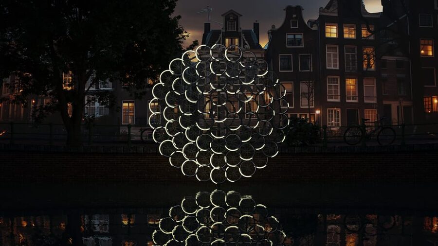 Amsterdam: Light Festival Canal Cruise w/Snack and Hot Drink - The 75-minute route: from Central Station through the photo-stop loop